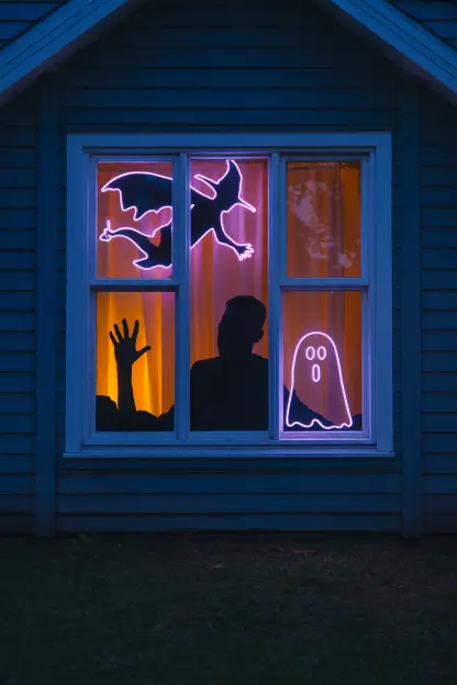 Glowing Window Silhouettes